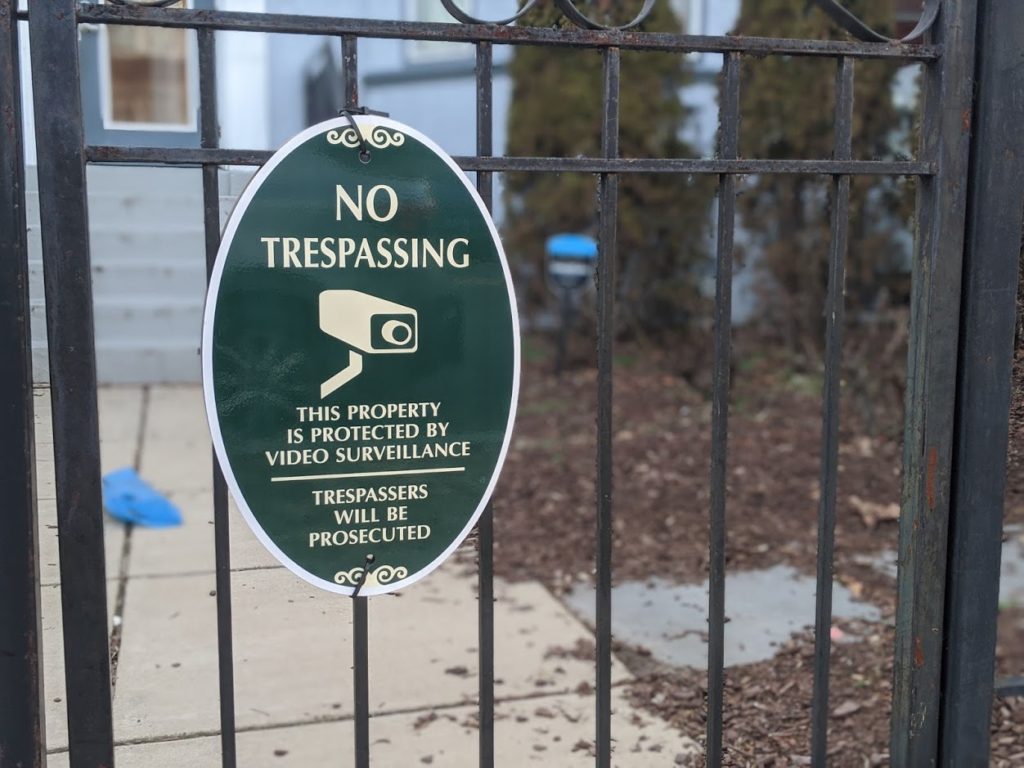 home surveillance disclosure sign