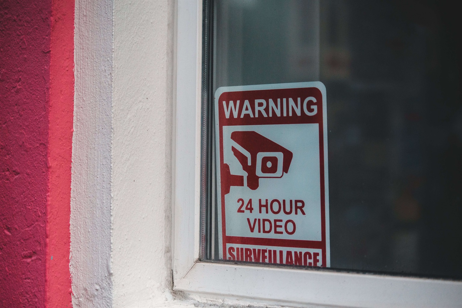 home surveillance information sign