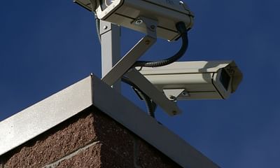 Do store staff monitor security cameras in stores?
