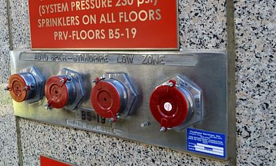 How do fire alarm systems work in hotels?
